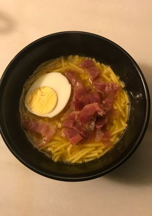 A picture of Noodle Soup with Serrano Ham and Hard-Boiled Egg.