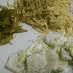 A picture of Chicken Pasta with Cucumber Salad.