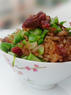 A picture of Preserved Duck Meat And Chinese Sausage Fried Rice.
