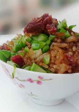 A picture of Preserved Duck Meat And Chinese Sausage Fried Rice.