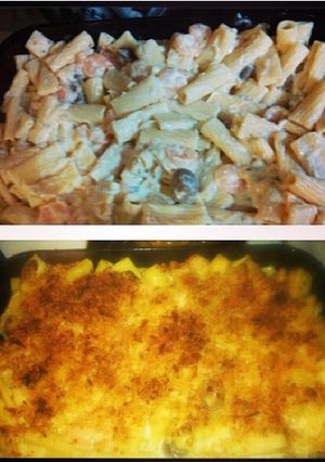 A picture of shrimp and mushroom Alfredo.