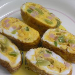 Tamagoyaki Japanese Omeletes for Bentos (Green Pepper and Ham) A picture of Tamagoyaki Japanese Omeletes for Bentos (Green Pepper and Ham).