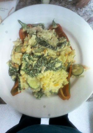 A picture of Vegetable risotto stuffed peppers.