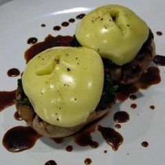 Sautee Minced Beef and Spinach in Bake Cheese Portobello Mushroom Serve with Balsamic Dressing A picture of Sautee Minced Beef and Spinach in Bake Cheese Portobello Mushroom Serve with Balsamic Dressing.