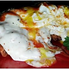 A picture of Mike's Crispy Chicken Fried Steak & Eggs.