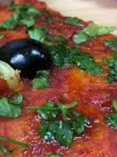 صورة لوصفة البيتزا الجزائرية الشعبية