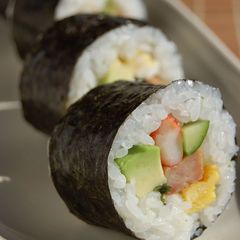 A picture of Sushi Rolls with Avocado & Spam.