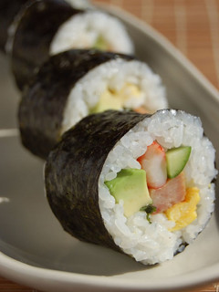 A picture of Sushi Rolls with Avocado & Spam.