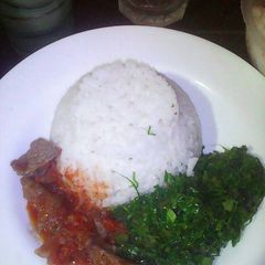 A picture of Rice beef with veges.