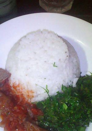 A picture of Rice beef with veges.