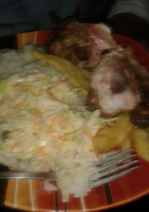 A picture of Grated cabbage and carrots salad.
