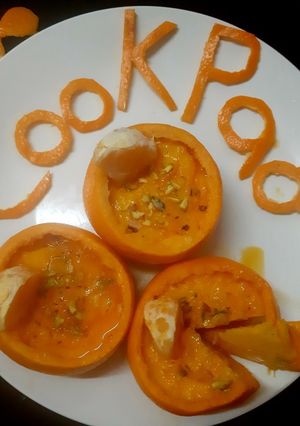 A picture of Orange,bread, Casturd, Cake.