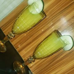 Orange cucumber juice A picture of Orange cucumber juice.