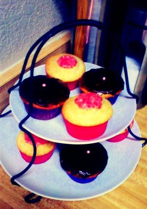 A picture of Chocolate ganache & Raspberry white zin Cupcakes.