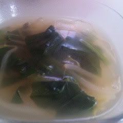 A picture of Alpine Leek Consommé Butter Soup.