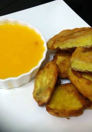 A picture of Beer Batter Sweet Potato With Orange Sauce.