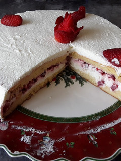 Una foto de Tarta de fresas con nata