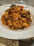 Arroz con pulpo y champiñones