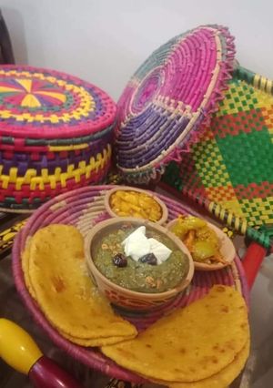 A picture of Sarso ka Saag or Makkai ki roti.
