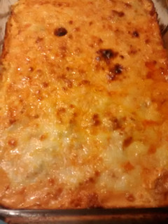 A picture of TL's Gimme More Layered Pizza Dip.