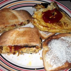 A picture of omlet on toast.