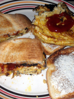 A picture of omlet on toast.