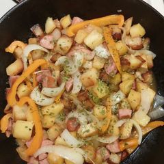A picture of Smothered Potatoes with Bell Pepper Onions Polish Sausage.