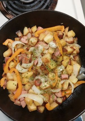 A picture of Smothered Potatoes with Bell Pepper Onions Polish Sausage.