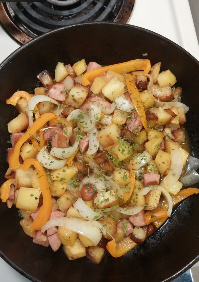 A picture of Smothered Potatoes with Bell Pepper Onions Polish Sausage.