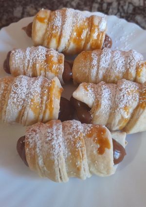 Una foto de Cañoncitos con dulce de leche