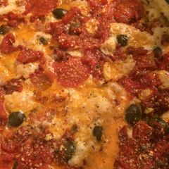 A picture of PIZZA ON THE GRILL.