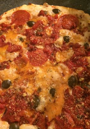 A picture of PIZZA ON THE GRILL.