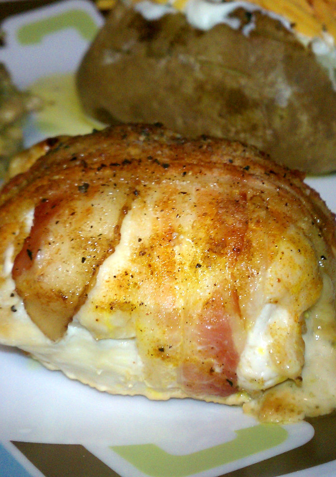 A picture of Bacon wrapped stuffed chicken.