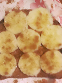A picture of Sprouted Grain Toast Almond Butter Banana and Cinnamon.