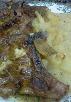 Una foto de Costillitas de cerdo con manzana