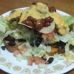 A picture of Open Face Nacho Cheeseburger.