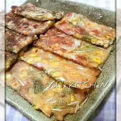 A picture of Pizza Flavoured Corn, Mizuna Leaves and Cheese.