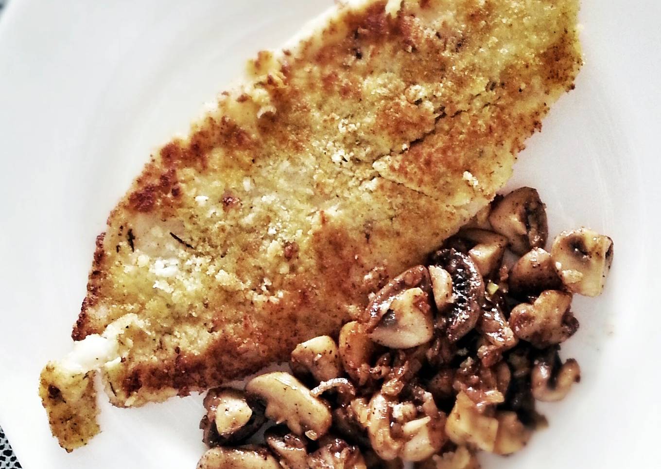 pan-fry fish with sauteed mushroom