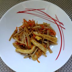 A picture of Japanese sautéed and braised burdock root(Kimpira Gobo) (V).