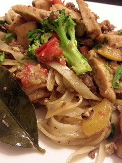 A picture of Sausage and chicken pad thai.