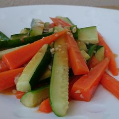 A picture of Stir Fry Carrot and Cucumber In Oxtail Soup.