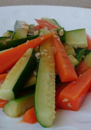 A picture of Stir Fry Carrot and Cucumber In Oxtail Soup.