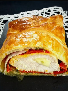 Una foto de Pollo Wellington