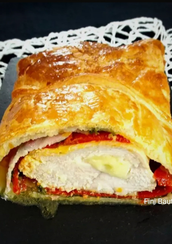 Una foto de Pollo Wellington