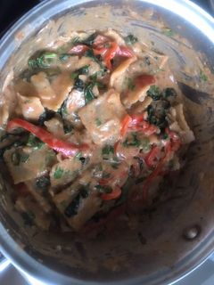 Una foto de Ravioles con crema de tomate al estilo italiano