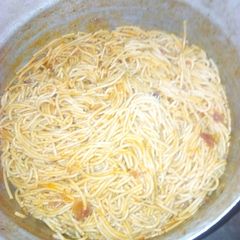 A picture of Naija jollofed fried spaghetti.