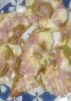 Una foto de Bifes de pollo a la pizza