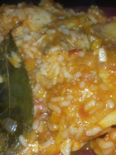 Una foto de Guiso De Arroz Con Pollo