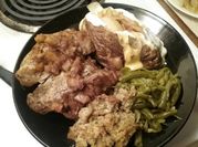 A picture of pork chops and stuffing