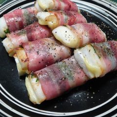 A picture of Hanpen Fish Cake and Cheese Wrapped with Shiso Leaves and Bacon.